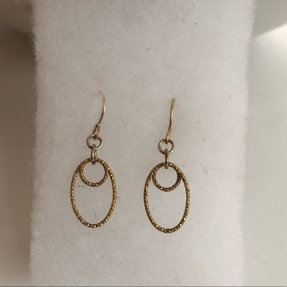 Delicate gold tone earrings